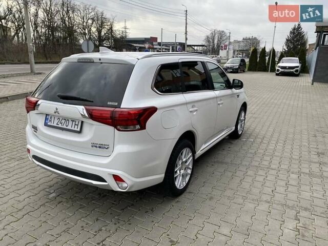 Білий Міцубісі Аутлендер, об'ємом двигуна 2 л та пробігом 118 тис. км за 17800 $, фото 13 на Automoto.ua