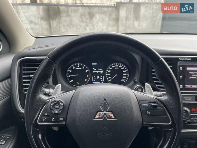 Белый Мицубиси Аутлендер, объемом двигателя 2.36 л и пробегом 112 тыс. км за 21500 $, фото 22 на Automoto.ua