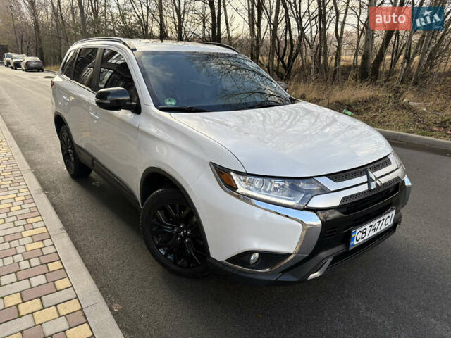 Білий Міцубісі Аутлендер, об'ємом двигуна 2.4 л та пробігом 130 тис. км за 15700 $, фото 1 на Automoto.ua