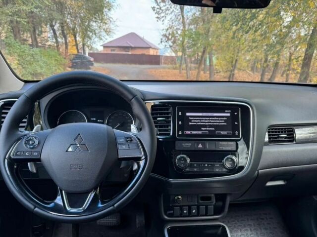 Мицубиси Аутлендер 2018 в Киеве на Automoto.ua Белый Мицубиси Аутлендер, объемом двигателя 2.4 л и пробегом 98 тыс. км за 12000 $, фото 7 на Automoto.ua