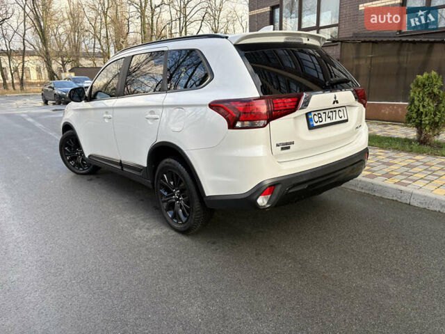 Білий Міцубісі Аутлендер, об'ємом двигуна 2.4 л та пробігом 130 тис. км за 15700 $, фото 5 на Automoto.ua