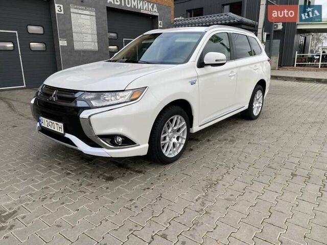 Білий Міцубісі Аутлендер, об'ємом двигуна 2 л та пробігом 118 тис. км за 17800 $, фото 33 на Automoto.ua