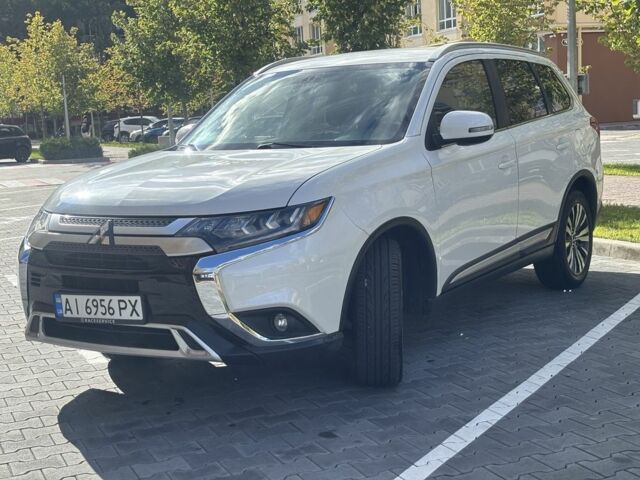 Білий Міцубісі Аутлендер, об'ємом двигуна 2.4 л та пробігом 91 тис. км за 15999 $, фото 2 на Automoto.ua