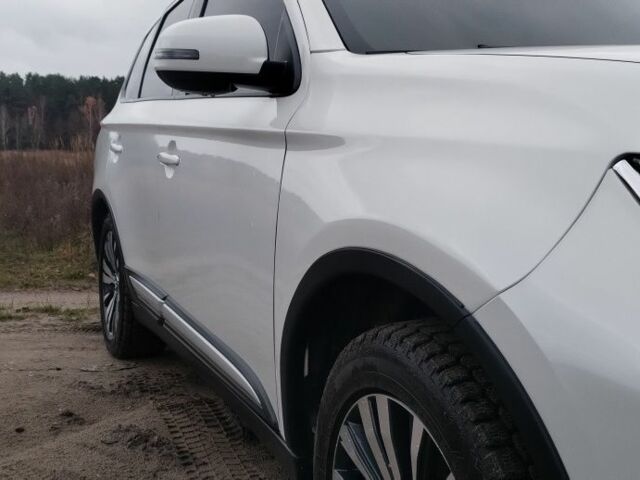 Белый Мицубиси Аутлендер, объемом двигателя 2.4 л и пробегом 122 тыс. км за 17400 $, фото 11 на Automoto.ua