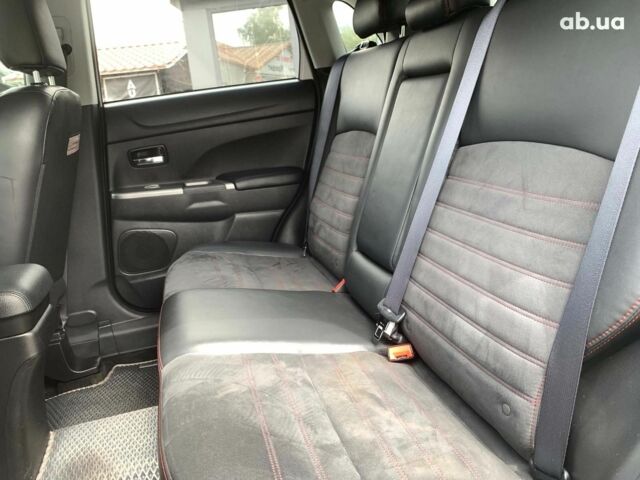 Білий Міцубісі Аутлендер, об'ємом двигуна 2.4 л та пробігом 101 тис. км за 14990 $, фото 22 на Automoto.ua