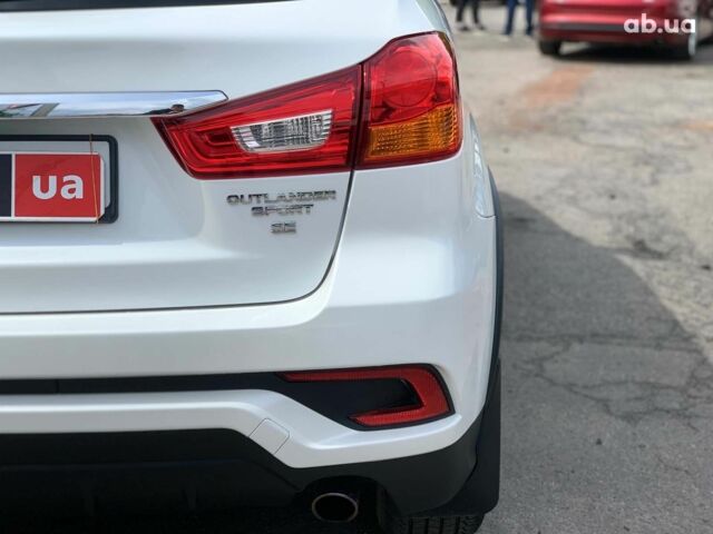 Білий Міцубісі Аутлендер, об'ємом двигуна 2.4 л та пробігом 101 тис. км за 14990 $, фото 12 на Automoto.ua