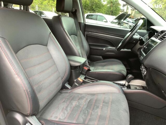 Білий Міцубісі Аутлендер, об'ємом двигуна 2.4 л та пробігом 101 тис. км за 14990 $, фото 24 на Automoto.ua