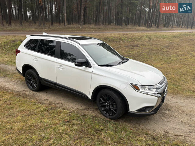 Білий Міцубісі Аутлендер, об'ємом двигуна 2.4 л та пробігом 130 тис. км за 16200 $, фото 4 на Automoto.ua