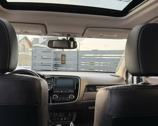 Белый Мицубиси Аутлендер, объемом двигателя 2.4 л и пробегом 91 тыс. км за 19199 $, фото 27 на Automoto.ua