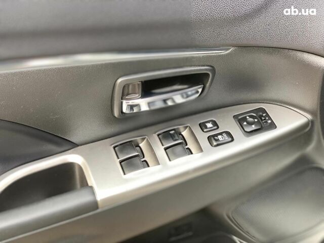 Білий Міцубісі Аутлендер, об'ємом двигуна 2.4 л та пробігом 101 тис. км за 14990 $, фото 19 на Automoto.ua