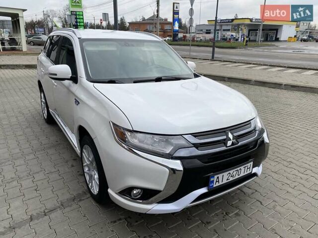 Білий Міцубісі Аутлендер, об'ємом двигуна 2 л та пробігом 118 тис. км за 17800 $, фото 1 на Automoto.ua