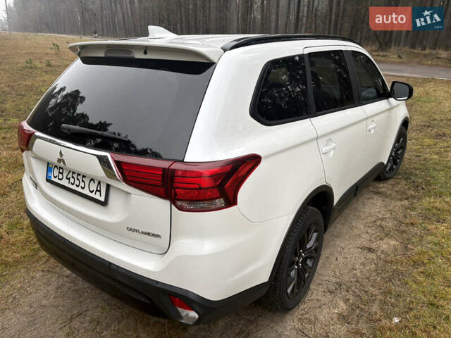 Білий Міцубісі Аутлендер, об'ємом двигуна 2.4 л та пробігом 130 тис. км за 16200 $, фото 3 на Automoto.ua