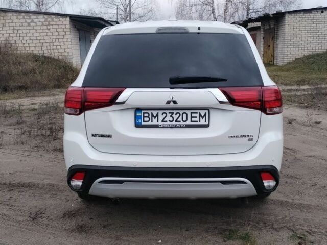 Белый Мицубиси Аутлендер, объемом двигателя 2.4 л и пробегом 122 тыс. км за 17400 $, фото 5 на Automoto.ua