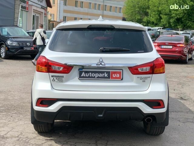 Білий Міцубісі Аутлендер, об'ємом двигуна 2.4 л та пробігом 101 тис. км за 14990 $, фото 5 на Automoto.ua