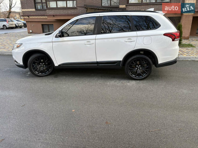 Білий Міцубісі Аутлендер, об'ємом двигуна 2.4 л та пробігом 130 тис. км за 15700 $, фото 6 на Automoto.ua