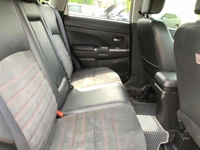 Білий Міцубісі Аутлендер, об'ємом двигуна 2.4 л та пробігом 101 тис. км за 14990 $, фото 25 на Automoto.ua