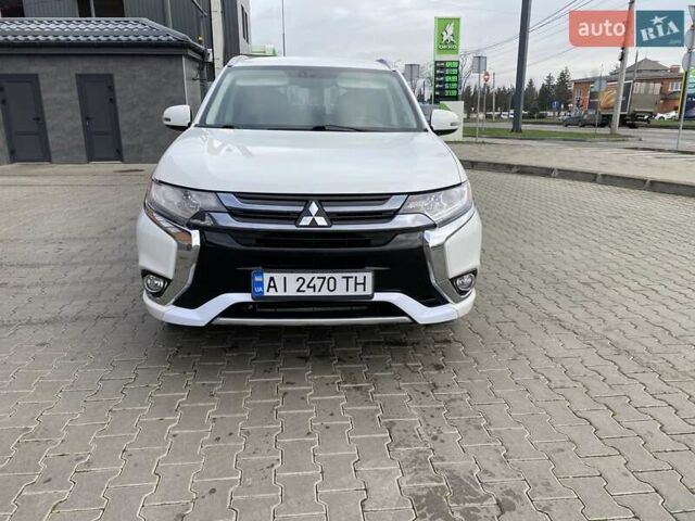 Білий Міцубісі Аутлендер, об'ємом двигуна 2 л та пробігом 118 тис. км за 17800 $, фото 64 на Automoto.ua