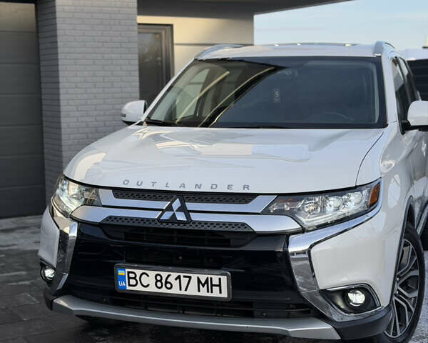 Белый Мицубиси Аутлендер, объемом двигателя 2.4 л и пробегом 91 тыс. км за 19199 $, фото 32 на Automoto.ua