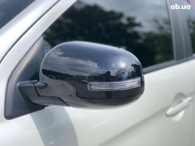 Білий Міцубісі Аутлендер, об'ємом двигуна 2.4 л та пробігом 101 тис. км за 14990 $, фото 10 на Automoto.ua