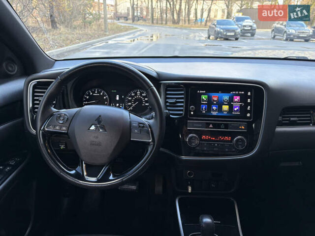 Білий Міцубісі Аутлендер, об'ємом двигуна 2.4 л та пробігом 130 тис. км за 15700 $, фото 8 на Automoto.ua