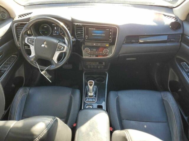 Белый Мицубиси Аутлендер, объемом двигателя 2 л и пробегом 129 тыс. км за 5100 $, фото 7 на Automoto.ua