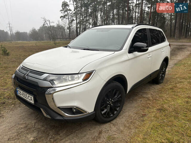 Білий Міцубісі Аутлендер, об'ємом двигуна 2.4 л та пробігом 130 тис. км за 16200 $, фото 1 на Automoto.ua