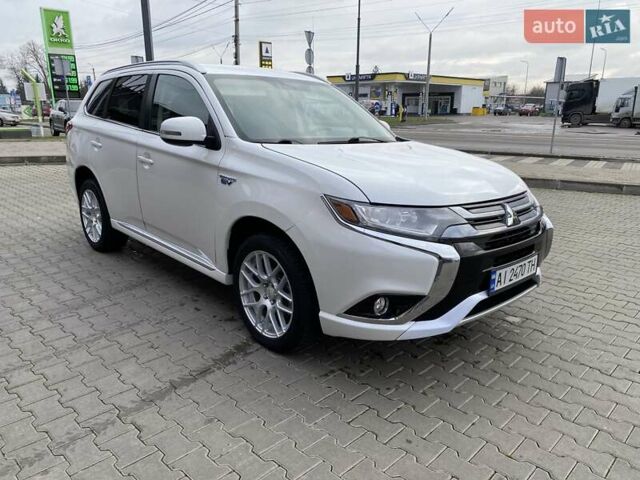 Білий Міцубісі Аутлендер, об'ємом двигуна 2 л та пробігом 118 тис. км за 17800 $, фото 26 на Automoto.ua