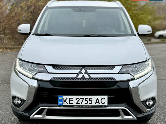 Білий Міцубісі Аутлендер, об'ємом двигуна 2.4 л та пробігом 190 тис. км за 14500 $, фото 2 на Automoto.ua