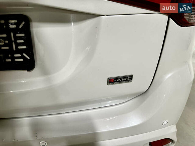 Белый Мицубиси Аутлендер, объемом двигателя 2 л и пробегом 70 тыс. км за 24300 $, фото 42 на Automoto.ua