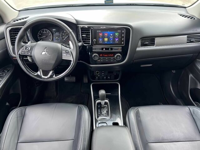 Белый Мицубиси Аутлендер, объемом двигателя 3 л и пробегом 39 тыс. км за 6700 $, фото 9 на Automoto.ua