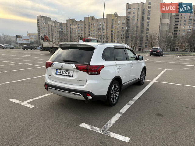 Білий Міцубісі Аутлендер, об'ємом двигуна 2.36 л та пробігом 168 тис. км за 19500 $, фото 4 на Automoto.ua
