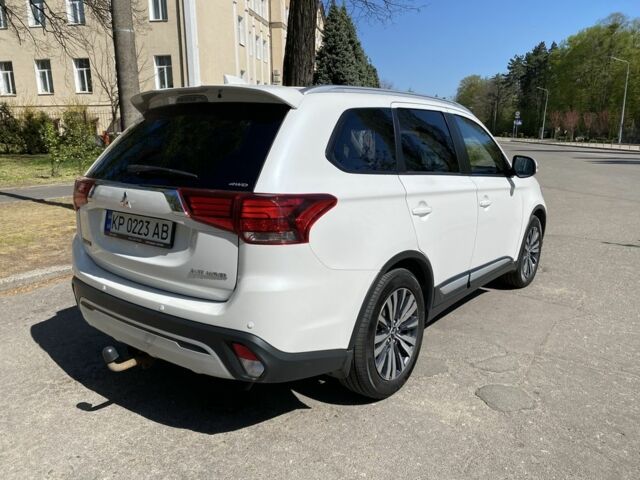 Білий Міцубісі Аутлендер, об'ємом двигуна 2.4 л та пробігом 147 тис. км за 21000 $, фото 1 на Automoto.ua