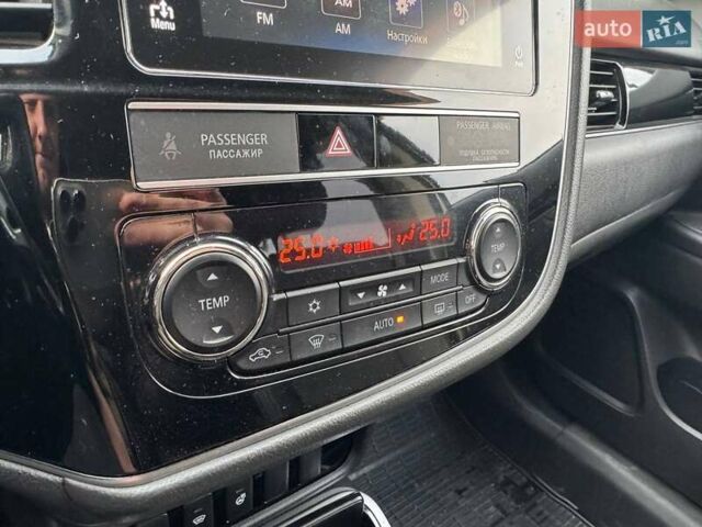 Белый Мицубиси Аутлендер, объемом двигателя 2.36 л и пробегом 169 тыс. км за 20490 $, фото 26 на Automoto.ua