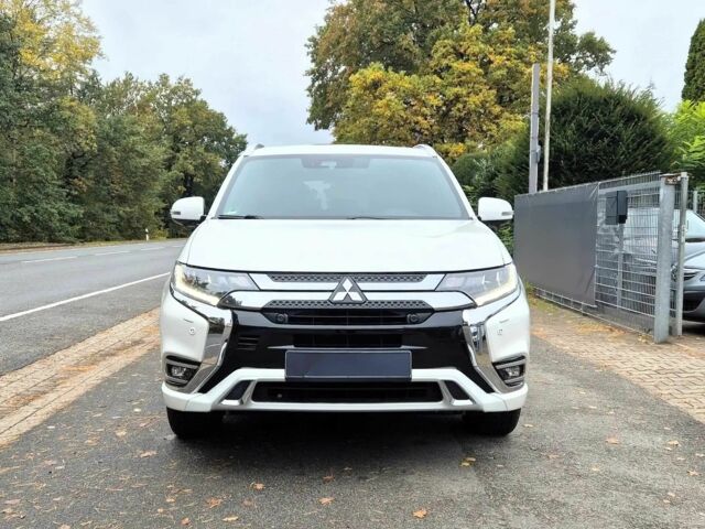 Белый Мицубиси Аутлендер, объемом двигателя 2.4 л и пробегом 42 тыс. км за 6000 $, фото 1 на Automoto.ua