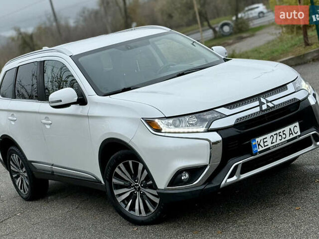 Білий Міцубісі Аутлендер, об'ємом двигуна 2.4 л та пробігом 190 тис. км за 14500 $, фото 4 на Automoto.ua