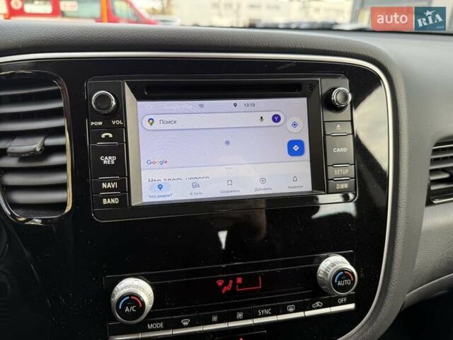 Білий Міцубісі Аутлендер, об'ємом двигуна 2 л та пробігом 19 тис. км за 17700 $, фото 34 на Automoto.ua