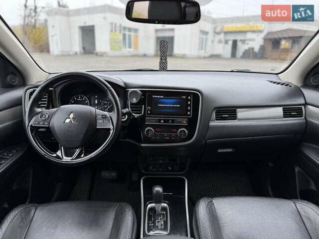 Білий Міцубісі Аутлендер, об'ємом двигуна 2.4 л та пробігом 190 тис. км за 14500 $, фото 17 на Automoto.ua