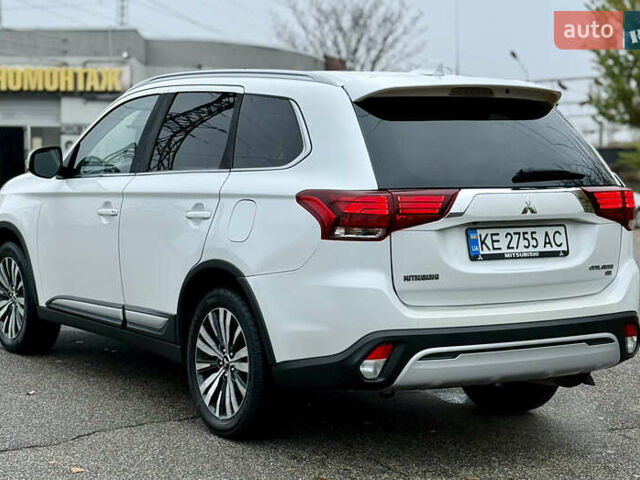 Білий Міцубісі Аутлендер, об'ємом двигуна 2.4 л та пробігом 190 тис. км за 14500 $, фото 8 на Automoto.ua