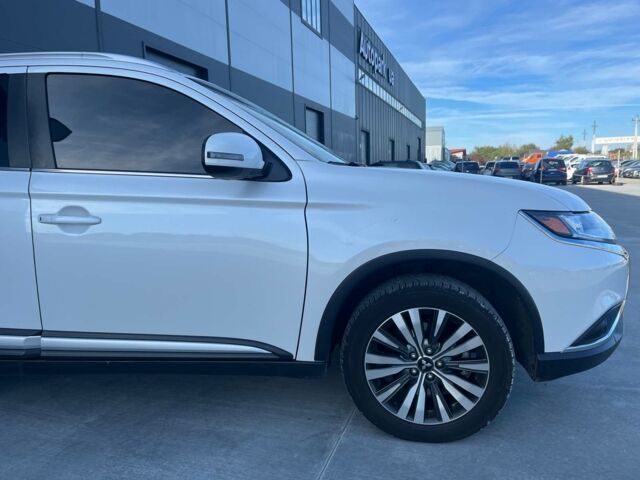 Белый Мицубиси Аутлендер, объемом двигателя 2.4 л и пробегом 120 тыс. км за 18990 $, фото 3 на Automoto.ua