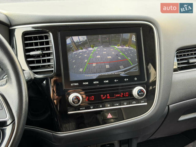 Білий Міцубісі Аутлендер, об'ємом двигуна 2 л та пробігом 52 тис. км за 21500 $, фото 52 на Automoto.ua