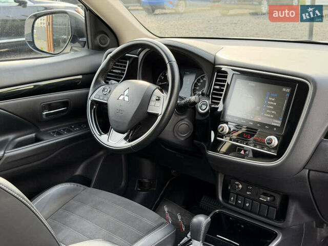 Білий Міцубісі Аутлендер, об'ємом двигуна 2 л та пробігом 52 тис. км за 21500 $, фото 40 на Automoto.ua