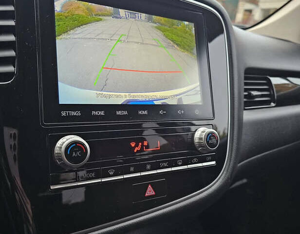 Білий Міцубісі Аутлендер, об'ємом двигуна 2 л та пробігом 74 тис. км за 16500 $, фото 11 на Automoto.ua