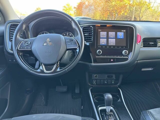 Белый Мицубиси Аутлендер, объемом двигателя 2.4 л и пробегом 44 тыс. км за 5800 $, фото 9 на Automoto.ua