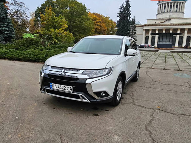 Білий Міцубісі Аутлендер, об'ємом двигуна 2 л та пробігом 74 тис. км за 16500 $, фото 6 на Automoto.ua