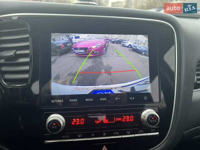 Белый Мицубиси Аутлендер, объемом двигателя 2.36 л и пробегом 59 тыс. км за 25000 $, фото 24 на Automoto.ua