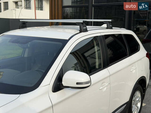 Білий Міцубісі Аутлендер, об'ємом двигуна 2 л та пробігом 52 тис. км за 21500 $, фото 13 на Automoto.ua