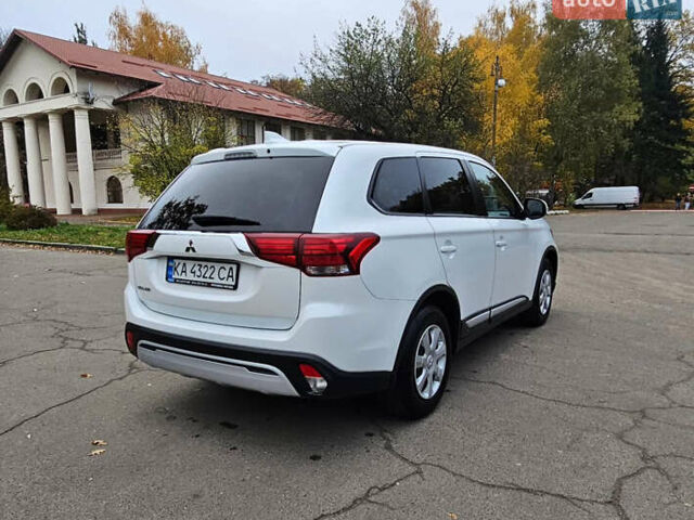 Білий Міцубісі Аутлендер, об'ємом двигуна 2 л та пробігом 74 тис. км за 16500 $, фото 10 на Automoto.ua