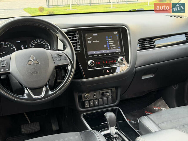 Білий Міцубісі Аутлендер, об'ємом двигуна 2 л та пробігом 52 тис. км за 21500 $, фото 37 на Automoto.ua