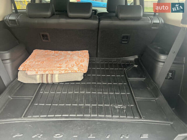 Белый Мицубиси Аутлендер, объемом двигателя 2.36 л и пробегом 59 тыс. км за 25000 $, фото 42 на Automoto.ua