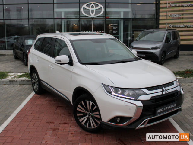 Білий Міцубісі Аутлендер, об'ємом двигуна 24 л та пробігом 56 тис. км за 24134 $, фото 1 на Automoto.ua